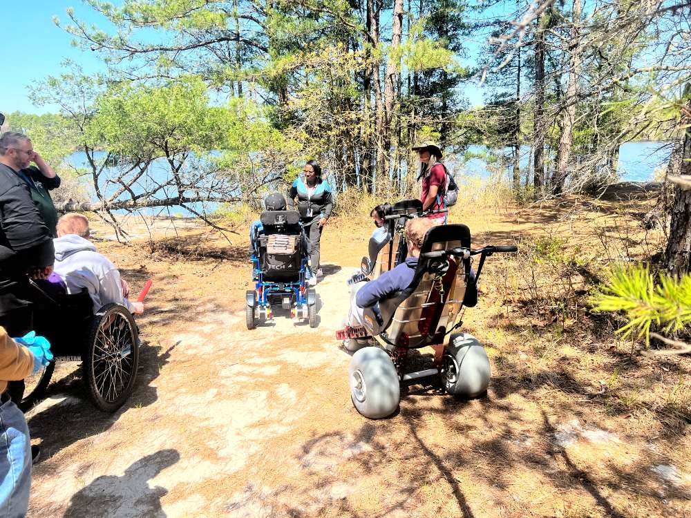 A group enjoying adaptive forest bathing in Atsion Forest