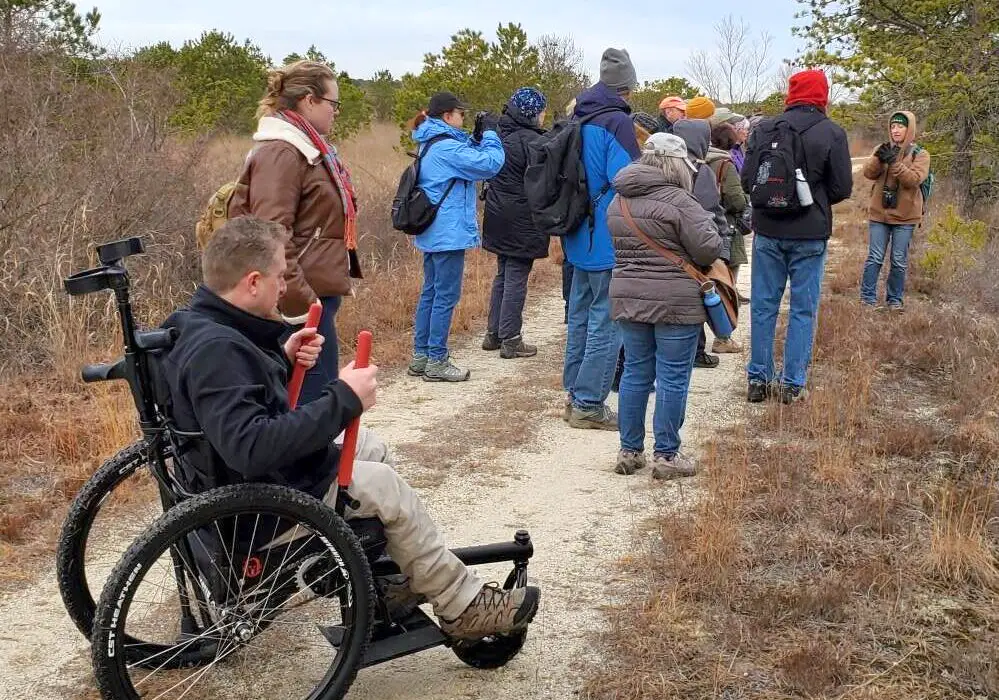 Access Nature Disabilty Advocate Sean Holland enjoying Pinelands Adventures Birding Event at Franklin Parker Preserve