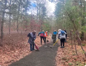 work group building an accessible trail