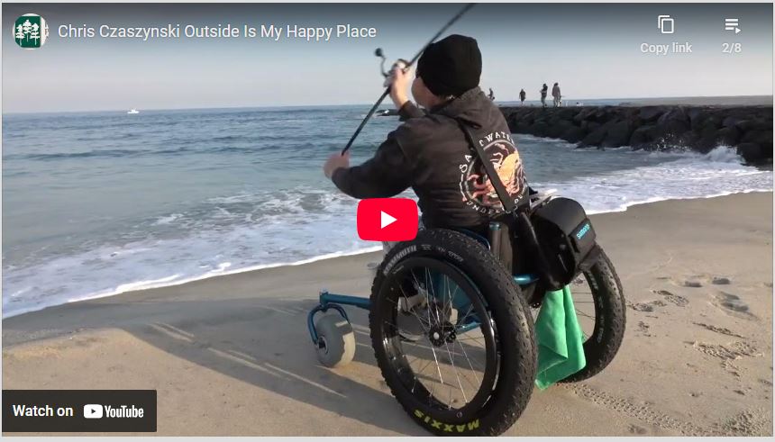 screenshot of a youtube clip of person in wheel chair fishing
