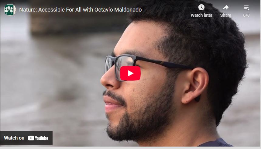 screenshot of youtube video of man with glasses